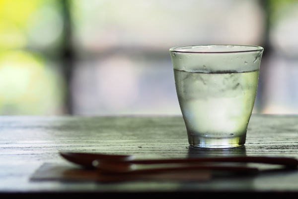 A glass of water on a café table