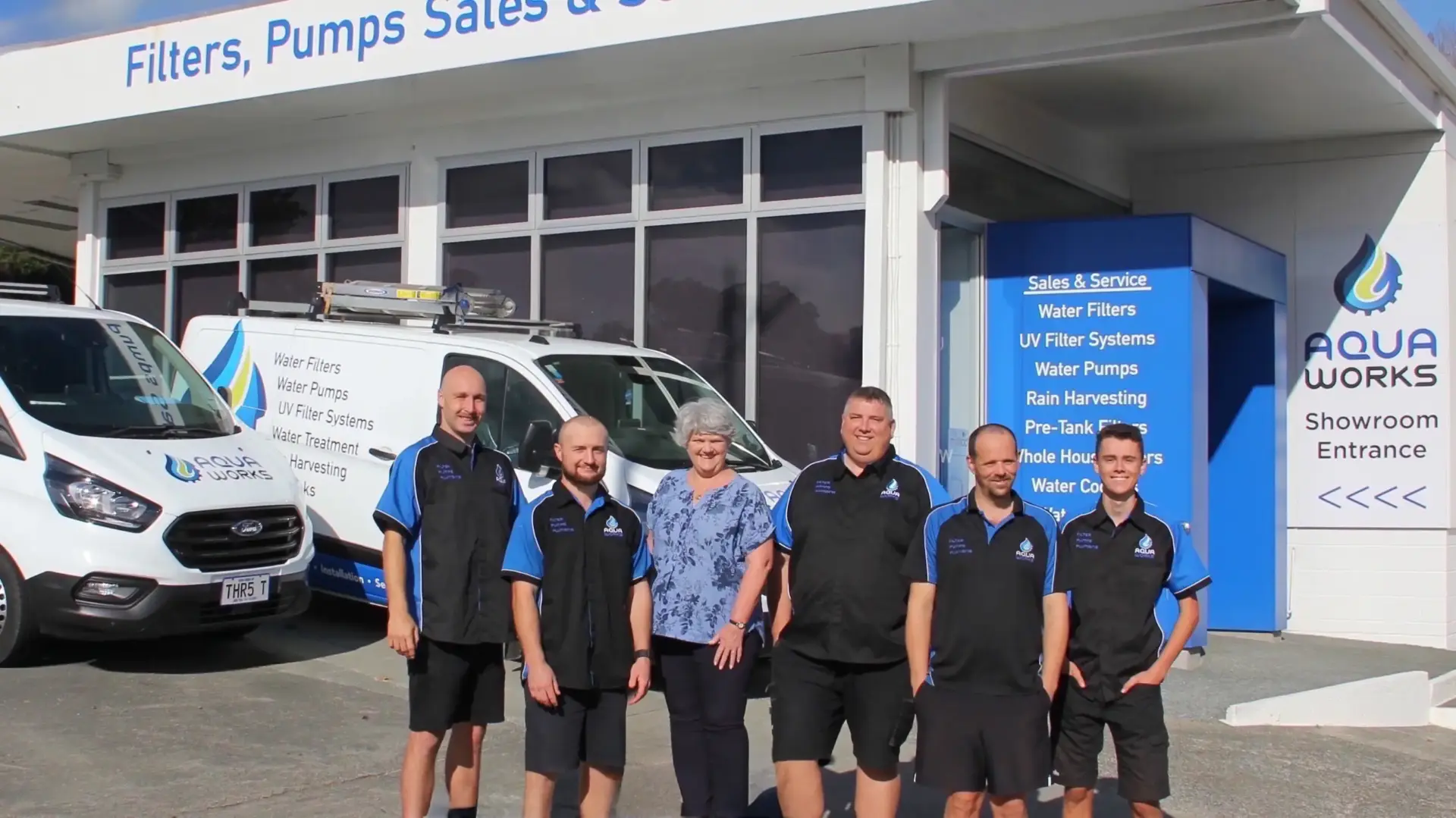 The Aqua Works team outside the showroom and office at 2 Mill Lane, Warkworth