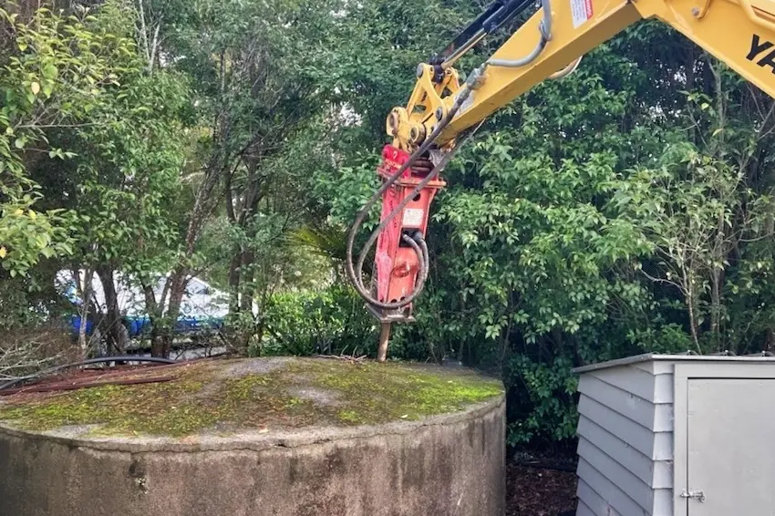 Aqua Works installing two 25,000-litre water tanks with site preparation and digger work