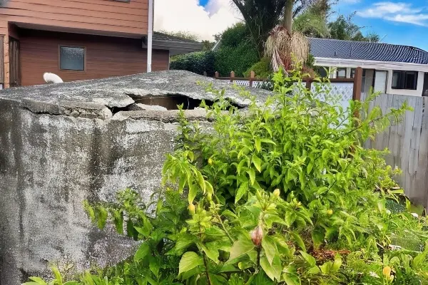 Old damaged concrete water tank before replacement in Omaha