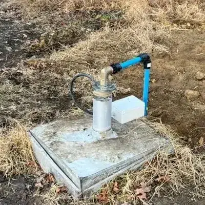 Bore head and pump outlet in a rural paddock