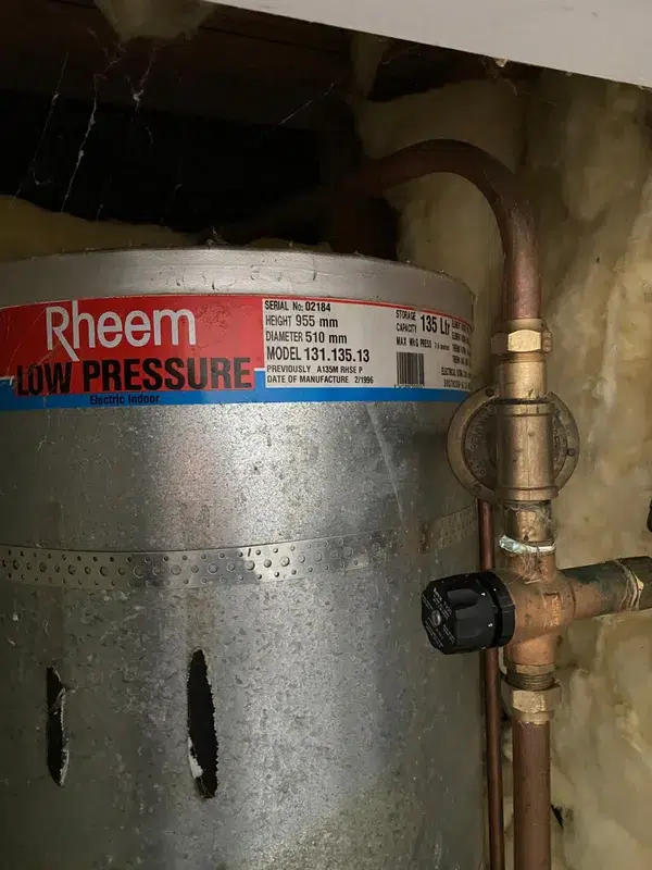 Hot water cylinder label showing a 1996 date of manufacture