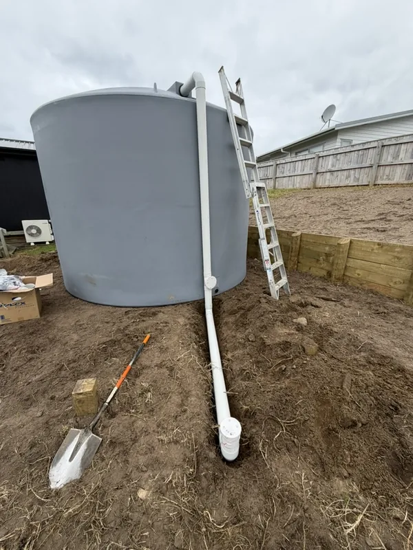 30,000 litre rainwater tank with its pipework ready to connect at a new home