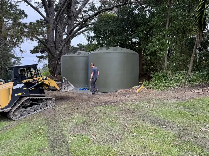 Two new 30,000 litre water tanks being installed by Aqua Works in Tindalls Beach