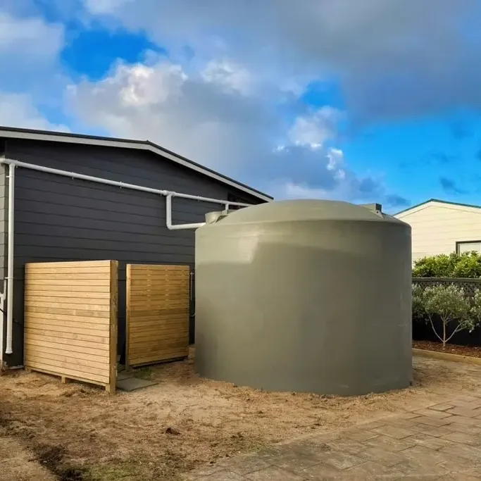 A rural home in Warkworth with its rainwater tank