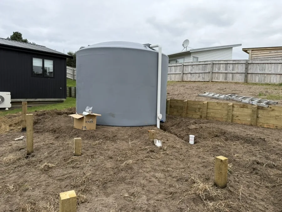 30,000 litre rainwater tank installed on a new section before the house is built