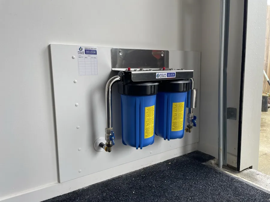 Whole house ioniser system mounted on a board in a Snells Beach garage